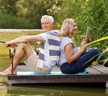 Couple sitting on a dock